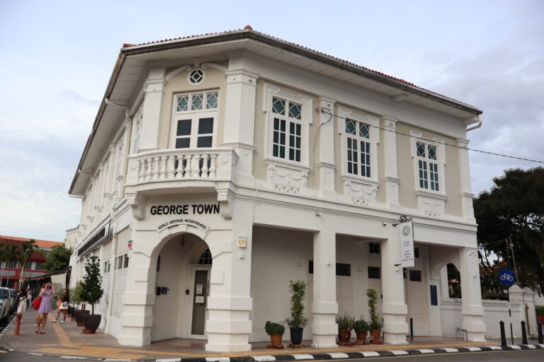 George Town World Heritage building, a white colonial-era heritage shophouse in the UNESCO core zone of George Town, Penang