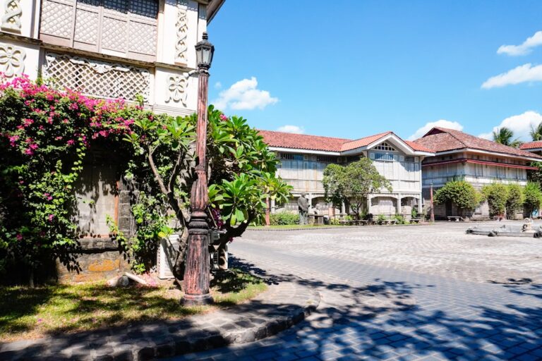 Historic colonial buildings and heritage lamppost in Vigan Philippines cobblestone courtyard